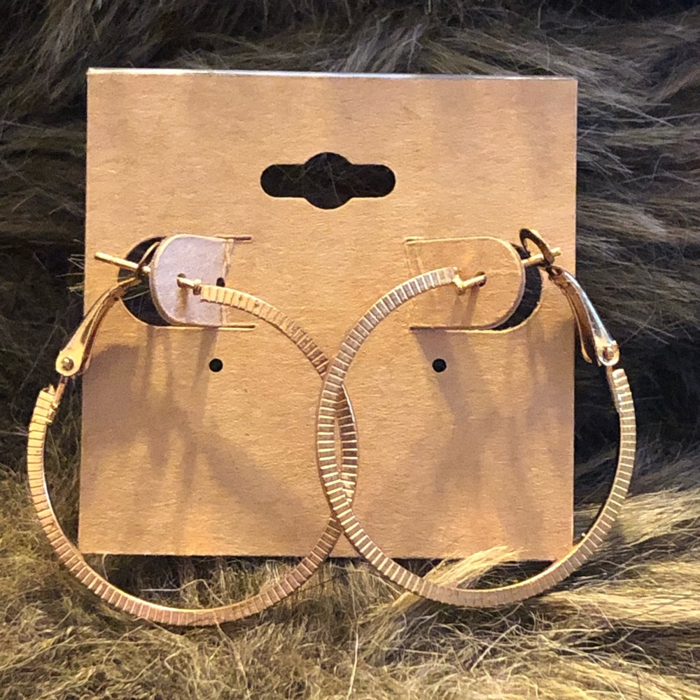 Gold plated textured omega back hoop earrings